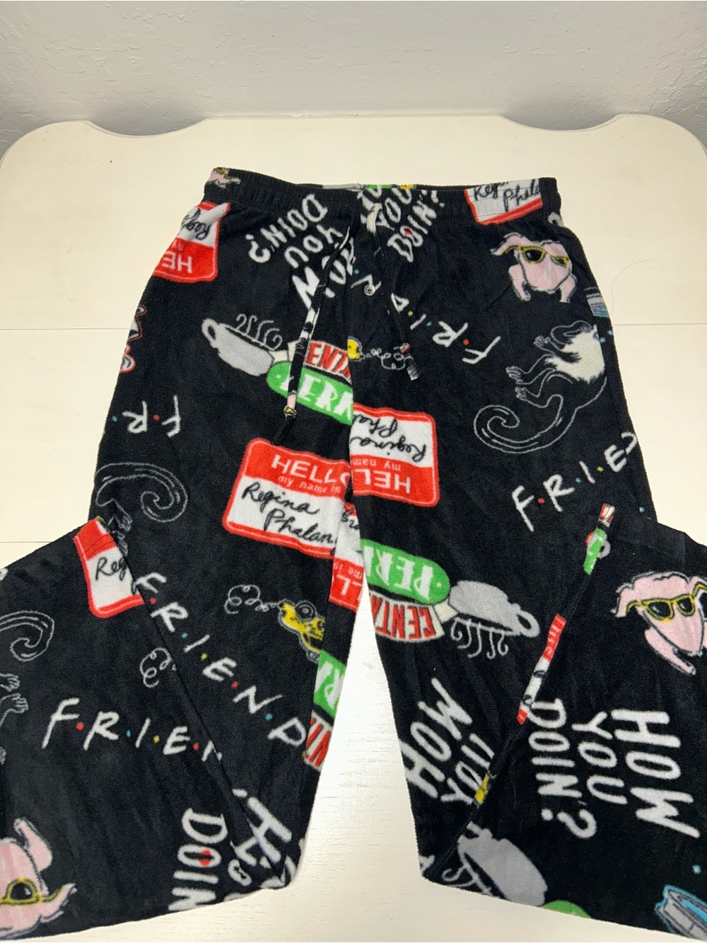 Friends Women’s Black Fleece Pajama Pants with Character Prints